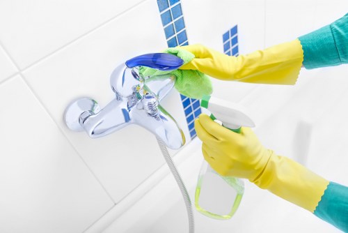Protective carpet cleaning setup with careful room protection measures